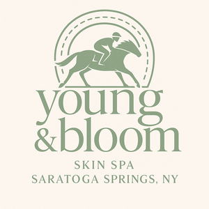 Young & Bloom Skin Logo stylized within a Horseshoe 