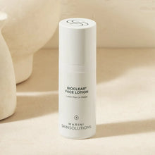 Load image into Gallery viewer, White bottle of Bioclear Face Lotion by Marini Skinsolutions on a beige background
