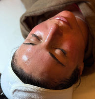 A happy customer with Radiant Skin after a relaxing custom facial at Young & Bloom Skin in Saratoga Springs