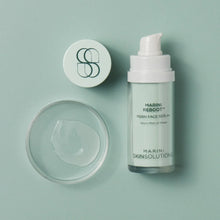 Load image into Gallery viewer, Marini Reboot Pore Face Serum bottle and container on a light green background
