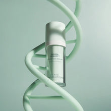 Load image into Gallery viewer, Skincare serum bottle with a DNA strand on a light green background
