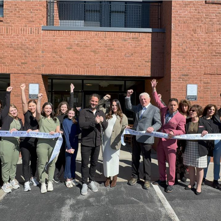 the Saratoga Chamber of Commerce cutting the ribbon at Young & Bloom Skin Spa in Saratoga Springs, NY