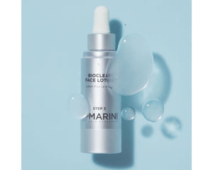 Marini Bioclean Face Lotion bottle with dropper on a light blue background