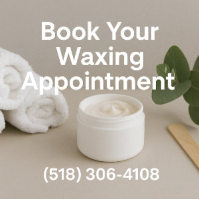 Book your waxing appointment in Saratoga Springs – calming spa setup with towels, cream, and eucalyptus