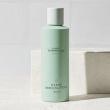 Load image into Gallery viewer, Green bottle of Marini Skinsolutions cleansing gel on a light background
