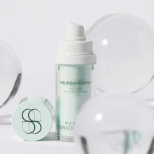 Load image into Gallery viewer, NeurosMOOTH skincare serum bottle with cap on a light gray background
