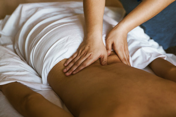 Deep Tissue Massage being performed on lower back of a client